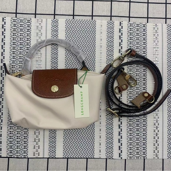 Longchamp Handbags - Longchamp Cream Mini Crossbody Bag